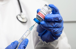 bigstock-Covid--Vaccine-In-Doctor-Han-425135702.jpg